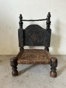 A vintage Punjabi low wedding chair with carved back and turned legs (H72cm W46cm D46cm SH18cm)