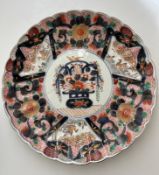 A 19th Century Imari scalloped edge Chinese charge with horse decoration Diameter 38cm