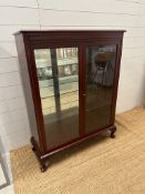 A Mid Century glazed display cabinet on cabriole legs with three glass shelves (H118cm D34cm W92cm)
