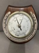 An English barometer from the 1930's with a aluminum racing horse shoe