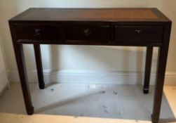 A hardwood console table with rattan style top (H90cm W115cm D40cm)