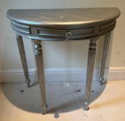 A Demi Lune painted silver side table (H77cm W85cm D38cm)