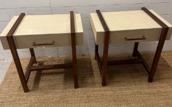 A pair of contemporary bedside tables with copper effort banding (H58cm W61cm D45cm)