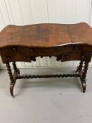 A mahogany ladies writing desk on spiral supports