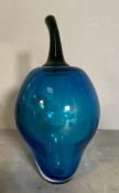 A blue art glass chilli pepper. Height 31cm