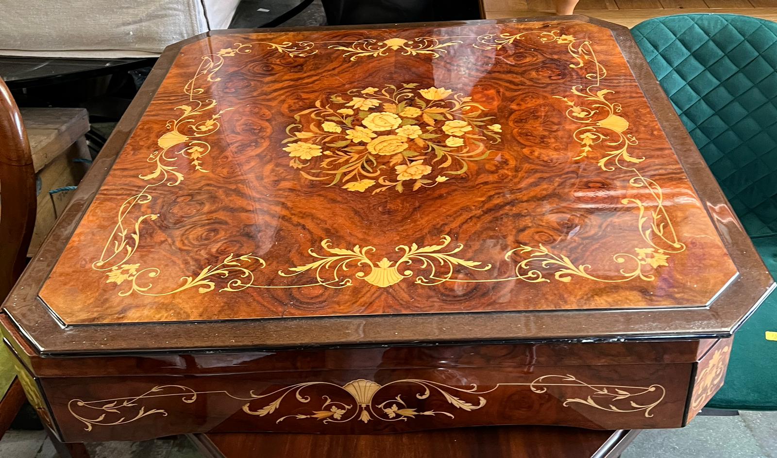 An Italian inlaid games table with roulette, chest and including games pieces