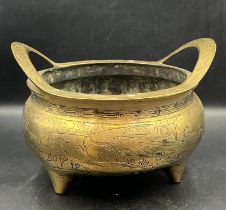 A 19th Century Chinese twin handled bronze censer D 23cm H 14cm