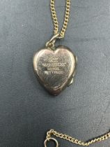 A 9ct front and back gold heart shaped locket AF Approx. weight 2.8g