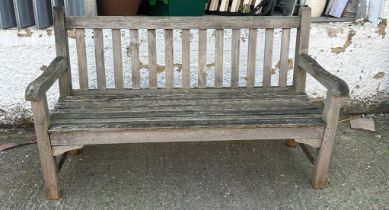A wooden two seater garden bench (H91cm W150cm D64cm)