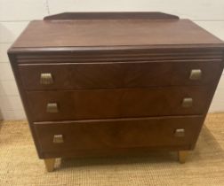 An Art Deco three drawer chest of drawers with galleried top (H76cm W91cm D46cm)