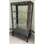 A hardwood, double side opening Chinese display cabinet with mother of pearl inlay and three glass