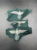 Three WWII German Army EM/NCO's breast eagles.