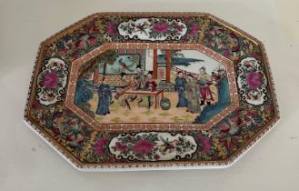 An oblong Chinese famille rose platter with Qianlong marking to base 36cm long