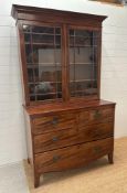 An Edwardian style two over three dresser with three shelf and glazed cabinet above on splayed