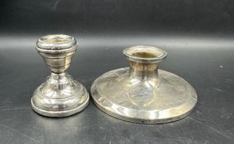 Two hallmarked silver squat candlesticks.