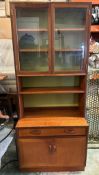 A G plan mid-century single drawer and single cupboard side board with glazed three shelf cabinet