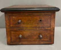 A two drawer table top cabinet with string inlay AF (H25cm W32cm D24cm)