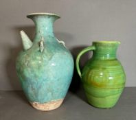 A Studio pottery green ground jug and a blue ground vase