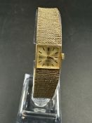 Omega gold ladies wristwatch 9ct gold with 9ct gold bracelet.