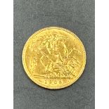 A 1909 Gold half sovereign