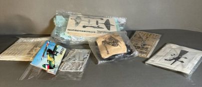 A selection of six unboxed model kits