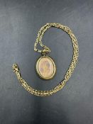 An antique pendant on an 18ct, marked 750 necklace, approximate total weight 8.7g