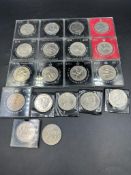 A selection of nineteen collectable Crown coins to include Royal Wedding, Silver Jubilee, Churchill