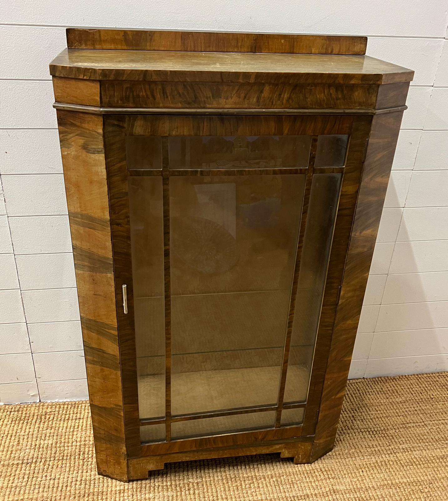 An Art Deco 1930'a cocktail cabinet still with the indent of a love letter written to a solider in