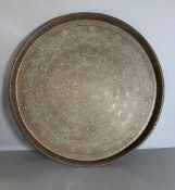 A Persian brass Tea Table top engraved.