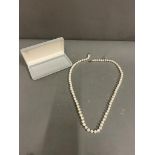 A water pearl necklace (Length 84cm)