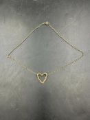 A 9ct gold heart on necklace (Approximate Total Weight 2.3g)