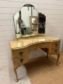 An art deco style dressing table on cabriole legs with glass top and folding vanity mirror. Table