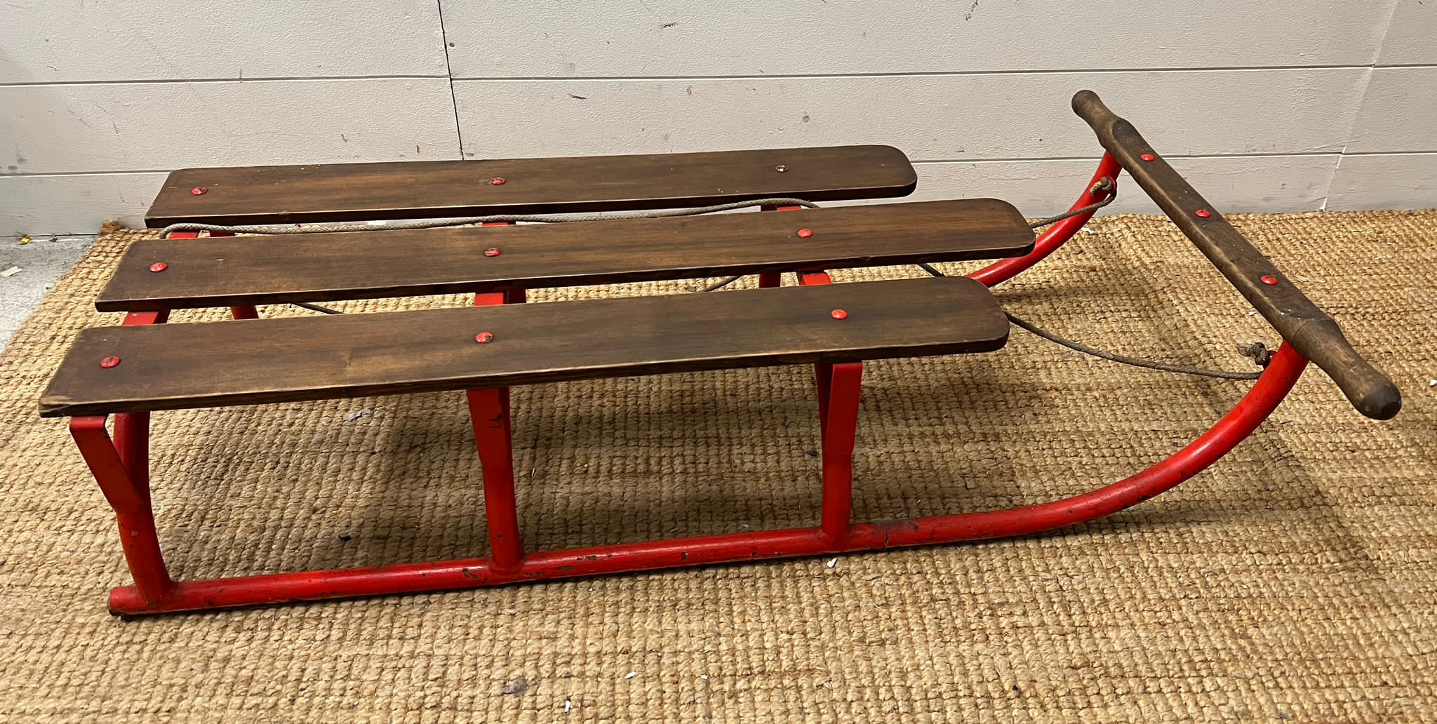 A vintage metal and wooden sledge (H26cm W110cm D62cm)