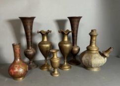 A selection of seven Persian copper and brass vases