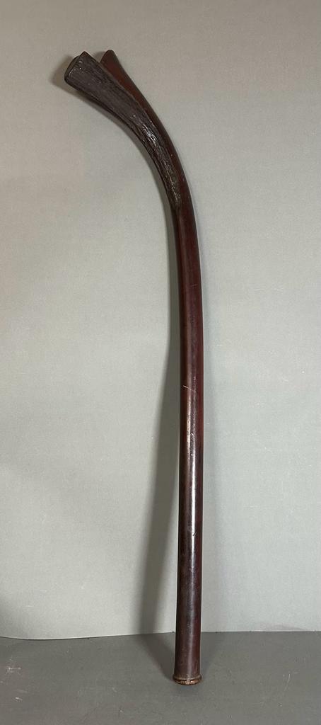 A Fijian Sali/Gata war club with carving to head, approximately 97cm in length.