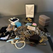 A volume of costume jewellery and watches