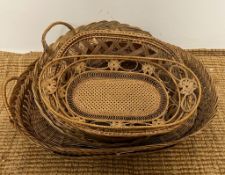 A collection of six wicker baskets