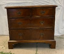 A flame mahogany two over three chests of drawers on bracket feet (H83cm W92cm D47cm)