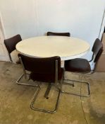 A white Formica topper circular table and four bent chrome and brown faux leather chairs AF (