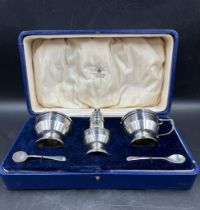 A Mappin and Webb silver, cased cruet set, hallmarked for Birmingham 1934.