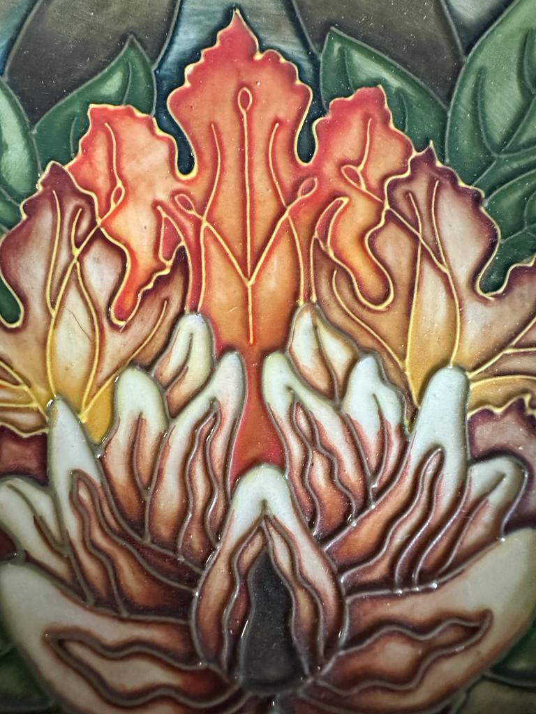 A Moorcroft plaque in the flame of the forest pattern - Image 2 of 3