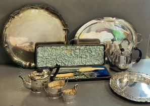 A selection of silver plate to include teapot, sugar bowl, trays etc