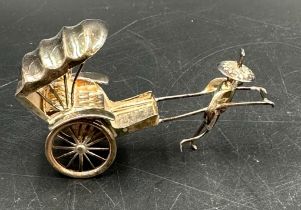 A miniature silver tuk tuk, marked 925 (total weight 12.5g)
