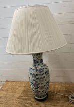 A floral decorated porcelain table lamp (H64cm)