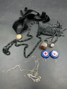 A small selection of quality costume jewellery to include silver rings, pendant coin purse and