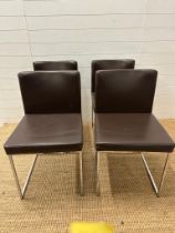 A set of four Italian Caligari's chairs upholstered in brown on chrome legs