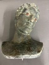 A resin bust of a Roman
