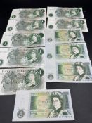 A selection of out of eleven out of circulation United Kingdom One Pound Notes.
