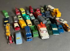 A selection of play worn Diecast toy cars to include Matchbox and Dinky, etc