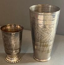 A white metal hammered beaker and one hammered continental silver footed beaker (H13.5cm Weight